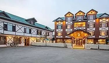 Apple Orchards Resorts & Spa lit up at dusk