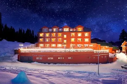 Grand Mumtaz Resorts Gulmarg on a snowy night