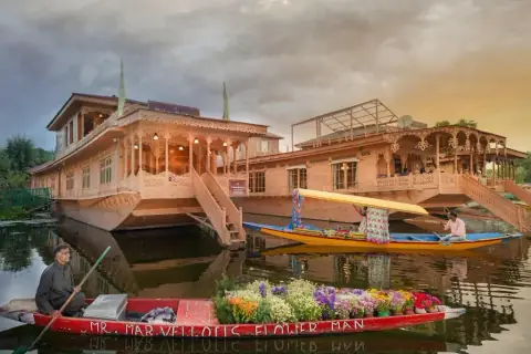 WelcomHeritage Gurkha Houseboats with a shikara flower seller
